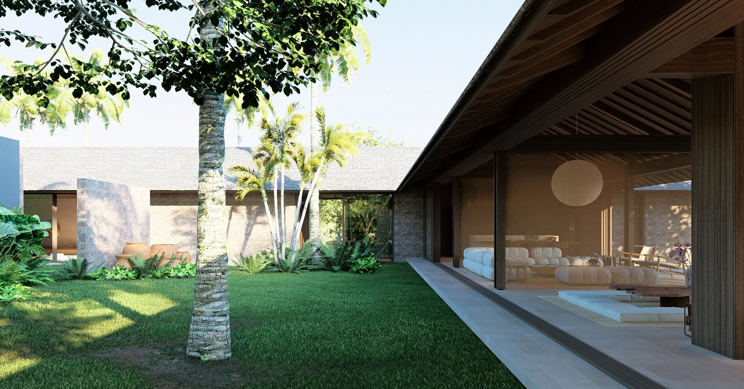 Contemporary tropical villa courtyard at Kelusa house integrating lush greenery, shaded terraces, and sustainable architectural design.