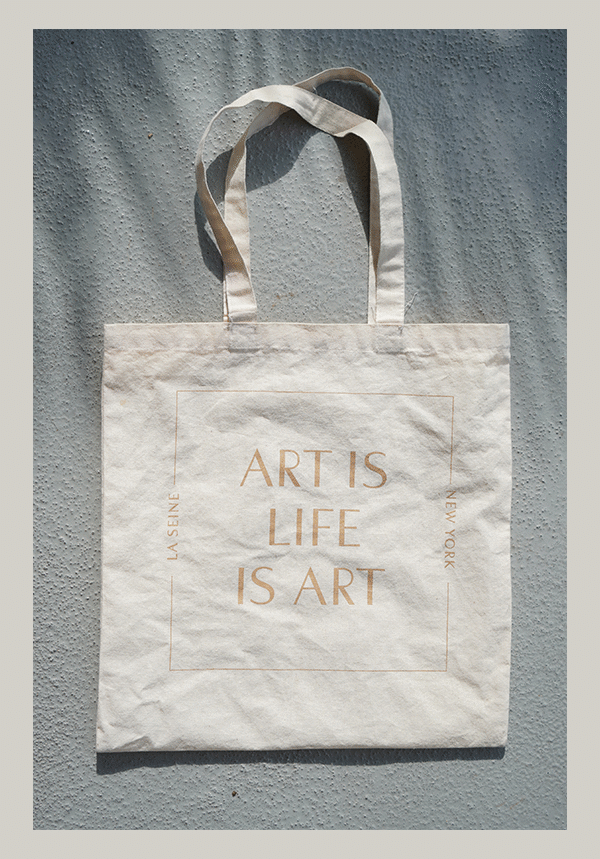 La Seine NY Life is Art carrying a good book