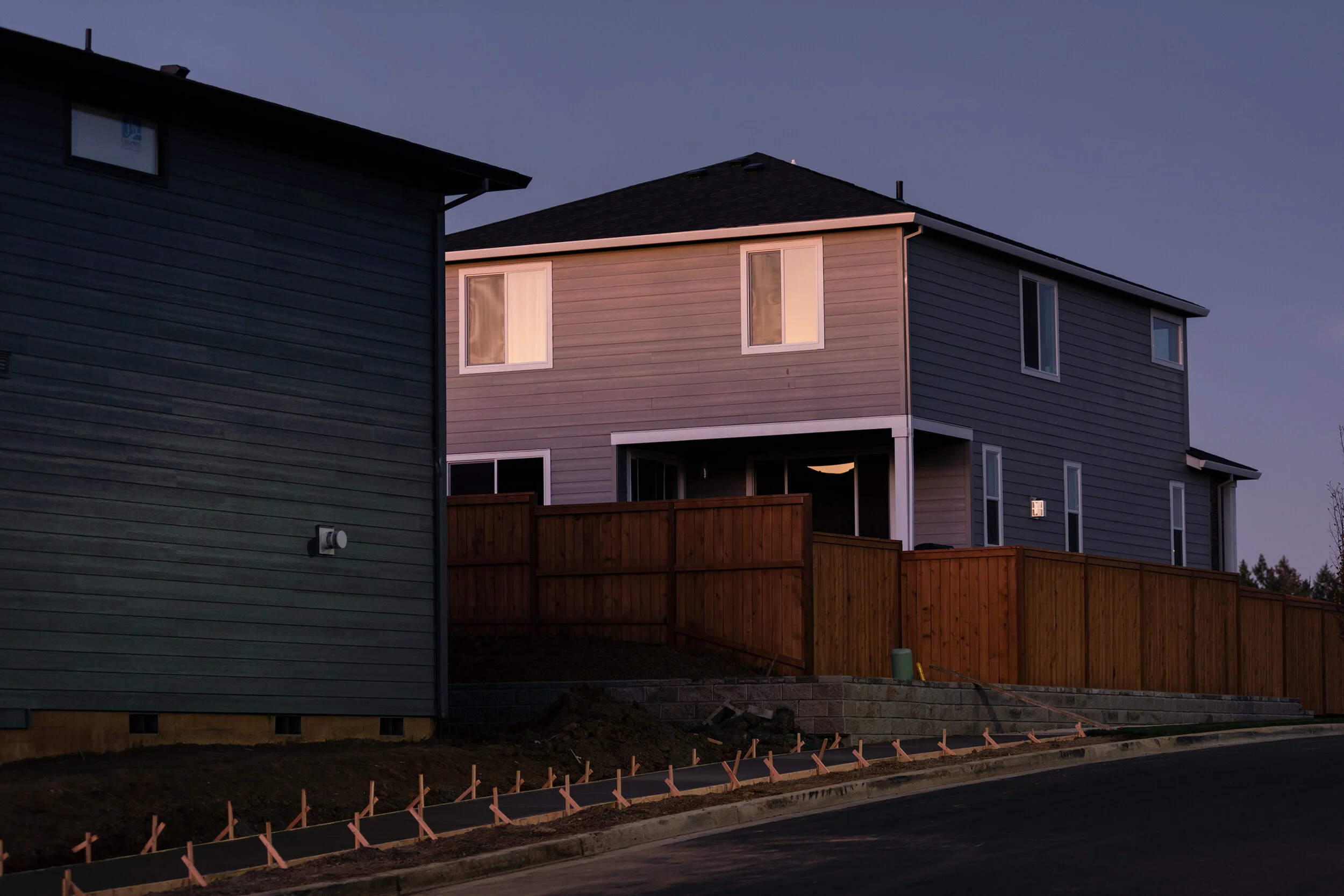 GreyHousesNewSidewalk.jpg