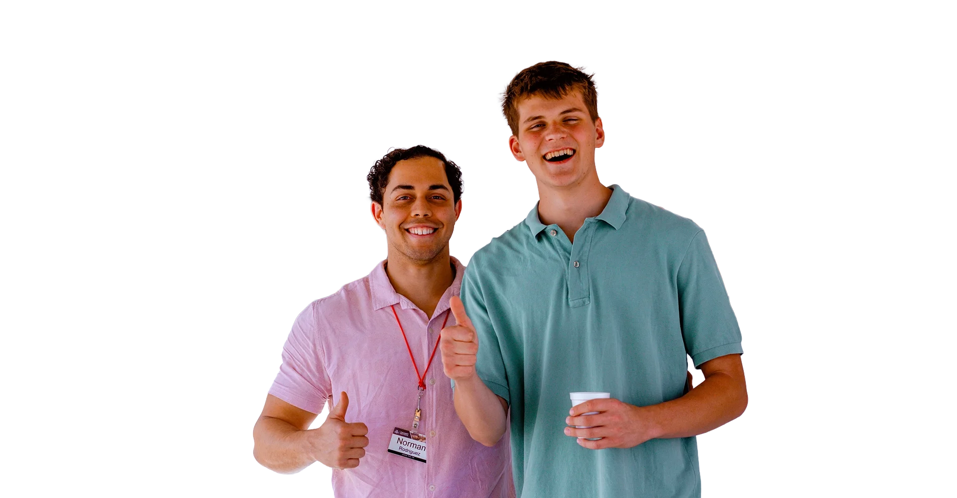Two men smiling; one gives a thumbs up, the other holds a cup, against a plain background.