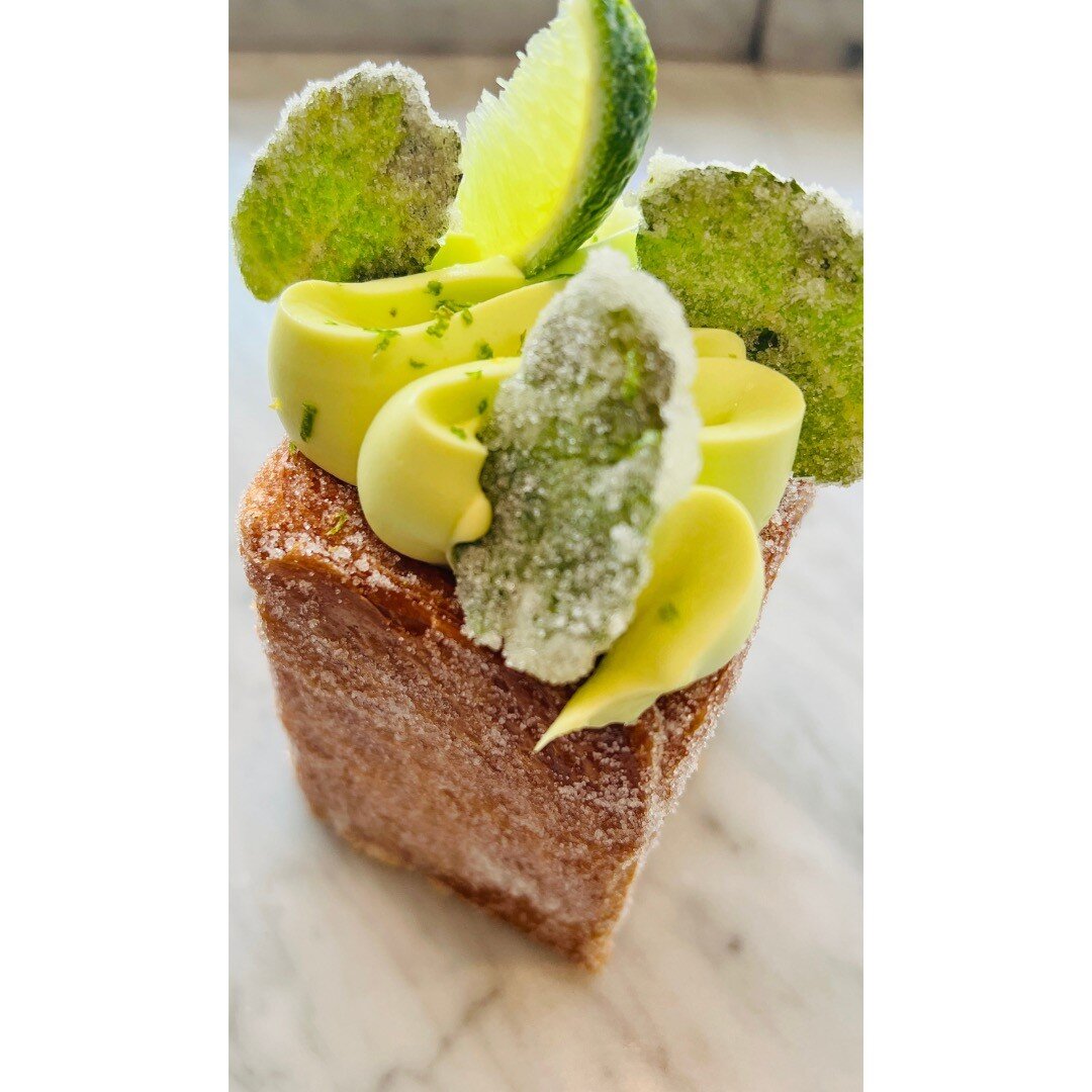 Mojito Croissant tower, Whipped white chocolate mint ganache, Stuffed with lime curd, candied mint and lime zest.  #chefstalk #chefsgossips #pastries #pastrychef #instagood #Pastry #Dessert #sogood #pastryelite #chefsofinstagram #gastroart #sweetscer