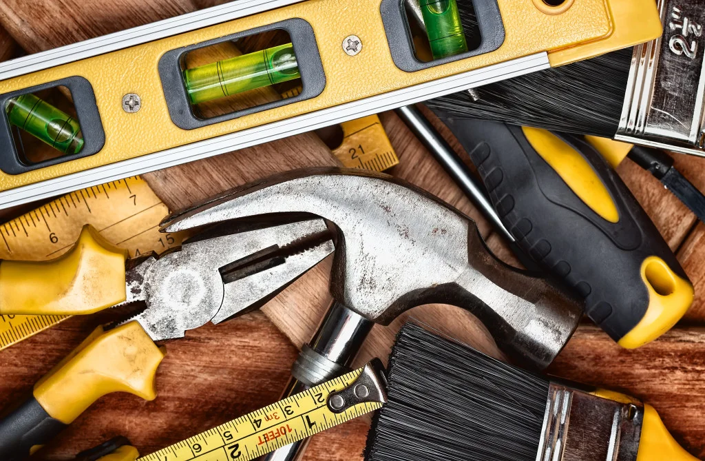 bigstock-Set-of-manual-tools-on-a-wood-26569409-1024x669.jpg
