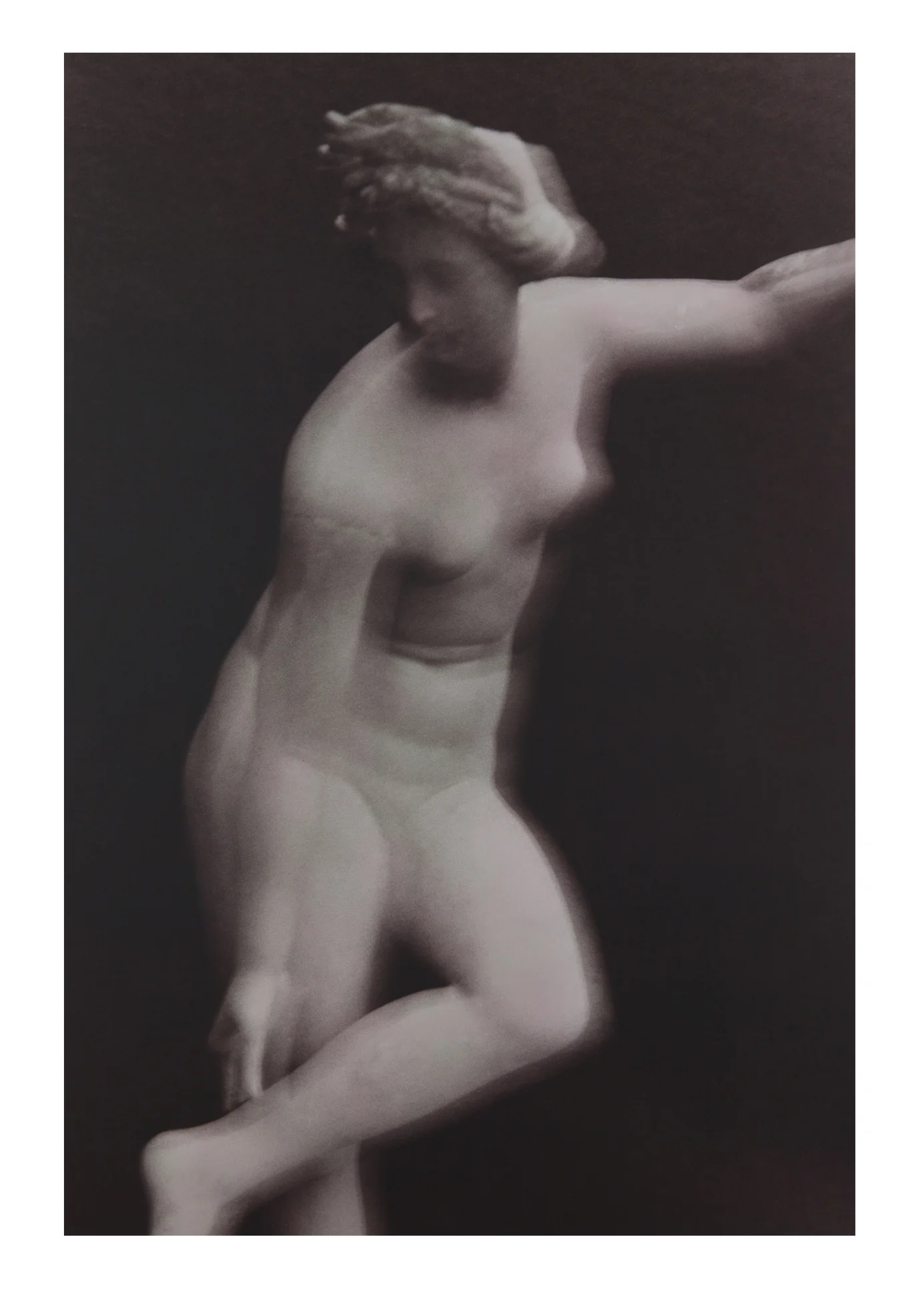 Aphrodite adjustingher sandle (lavender) Hand-toned Silver Gelatin Print 10 X 15” 1998