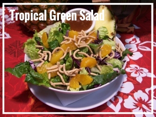 EXOTIC ISLAND SALAD A lovely addition to a tropical buffet table and also a perfect compliment for any of our entree dishes. Mixed greens, thinly sliced red cabbage, tangy mandarin oranges, and crispy chow mein noodles are tossed in a sweet Asian sesame dressing and served with fresh pineapple wedges. Medium Tray - approximately 10-15 guests, $40 Large Tray - approximately 20-30 guests, $80