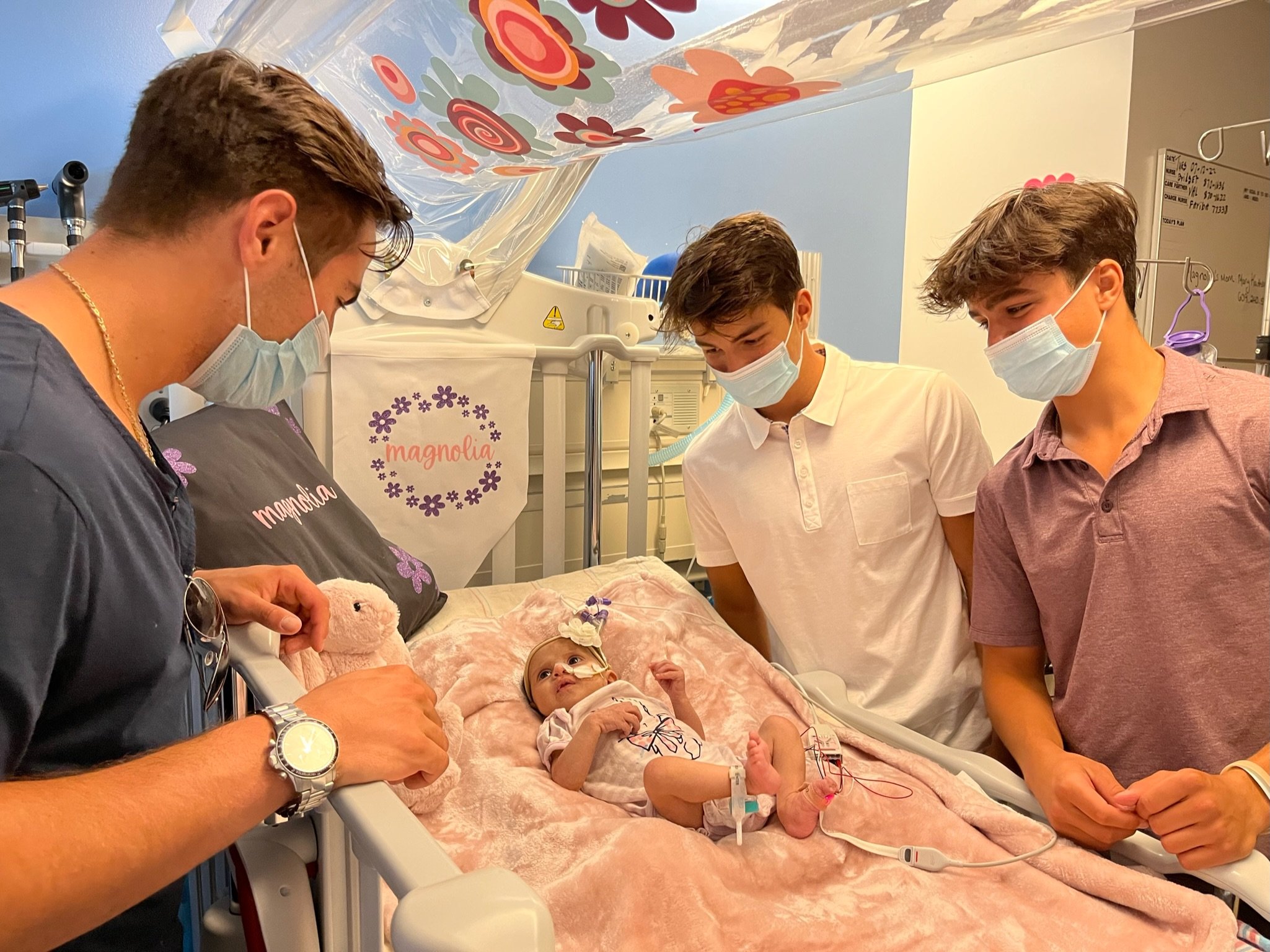 Santa visits newborn babies Helen DeVos Children's Hospital