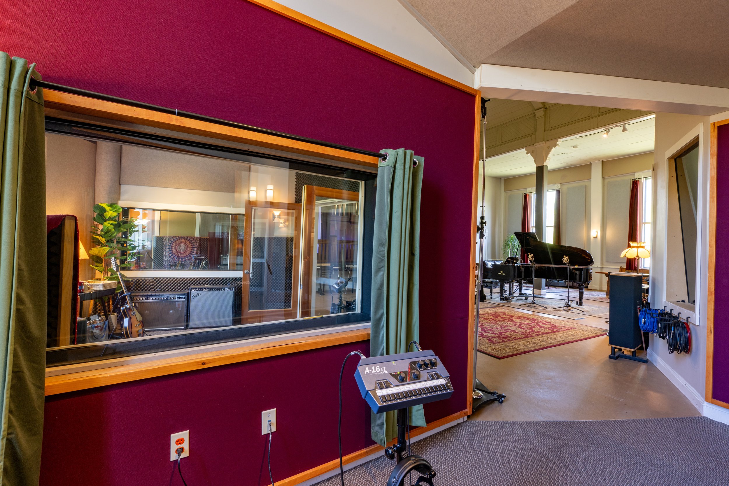 Looking out into the main live room and second iso booth from the acoustically “dead” area of the live room.