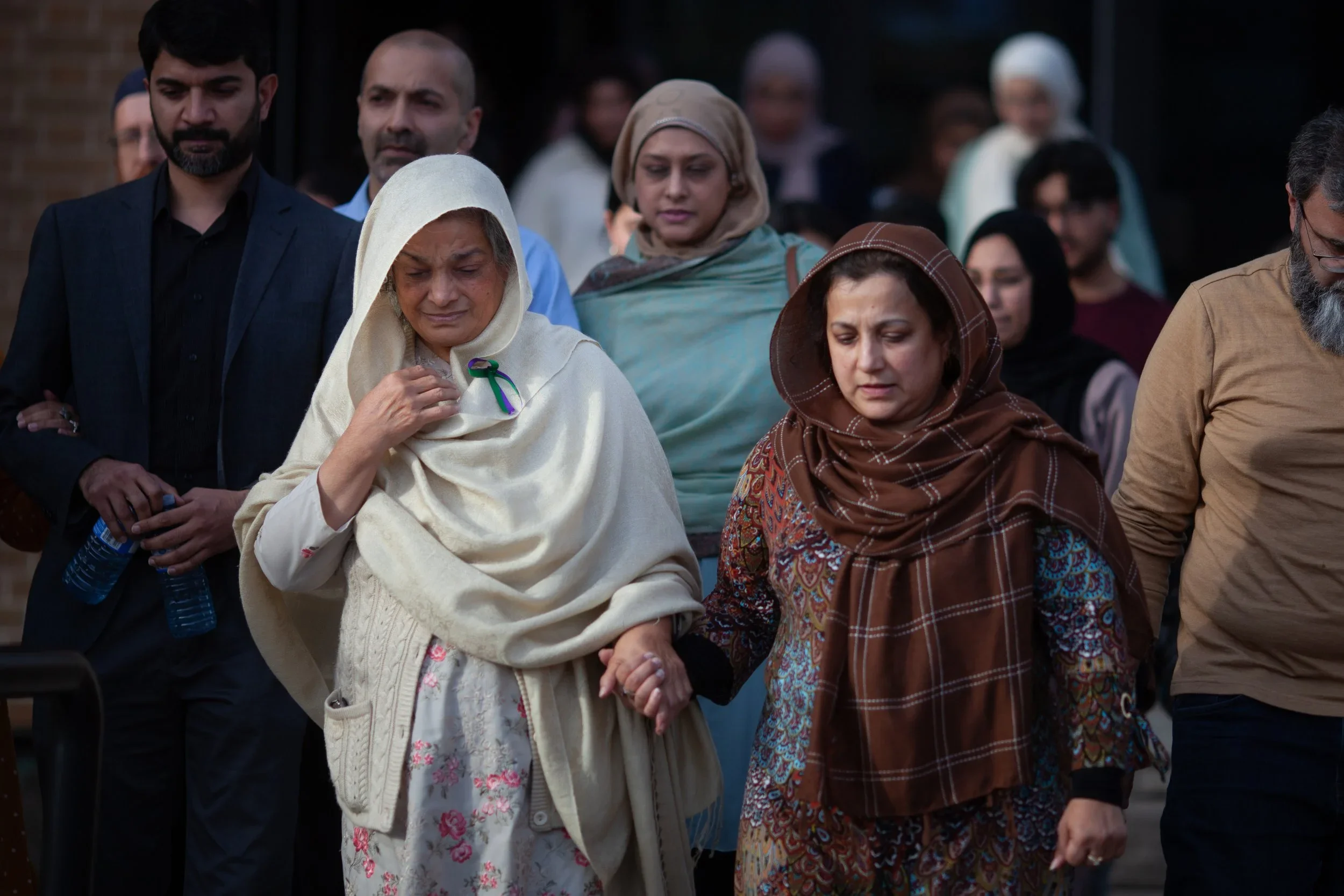  Family and friends of the Afzaal family exit the Superior Court of Justice in Windsor after a verdict in the Nathaniel Veltman murder trial was reached (for the Canadian Press, 2023). 