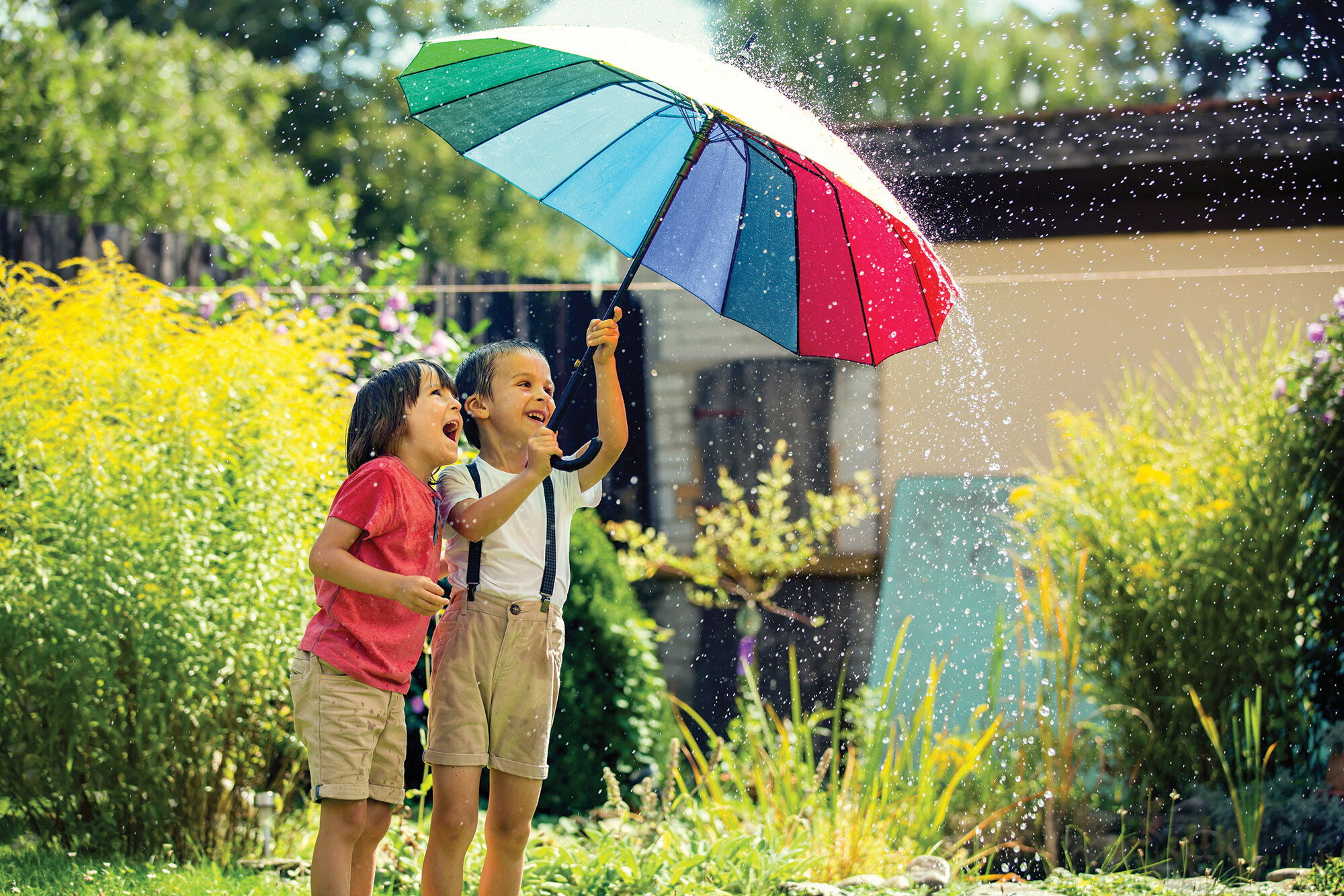 AdobeStock_149180766 Umrbrella kids rainbow small.jpg