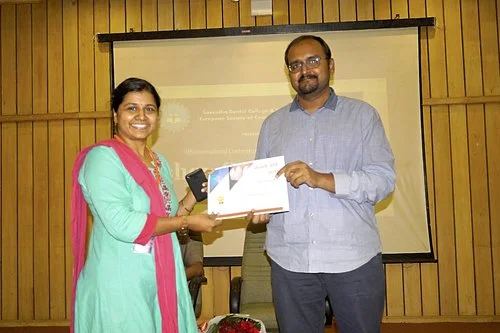 Dr.Subha getting the ‘Best Paper Award’ in Showcase 2018 from the Director of Academics