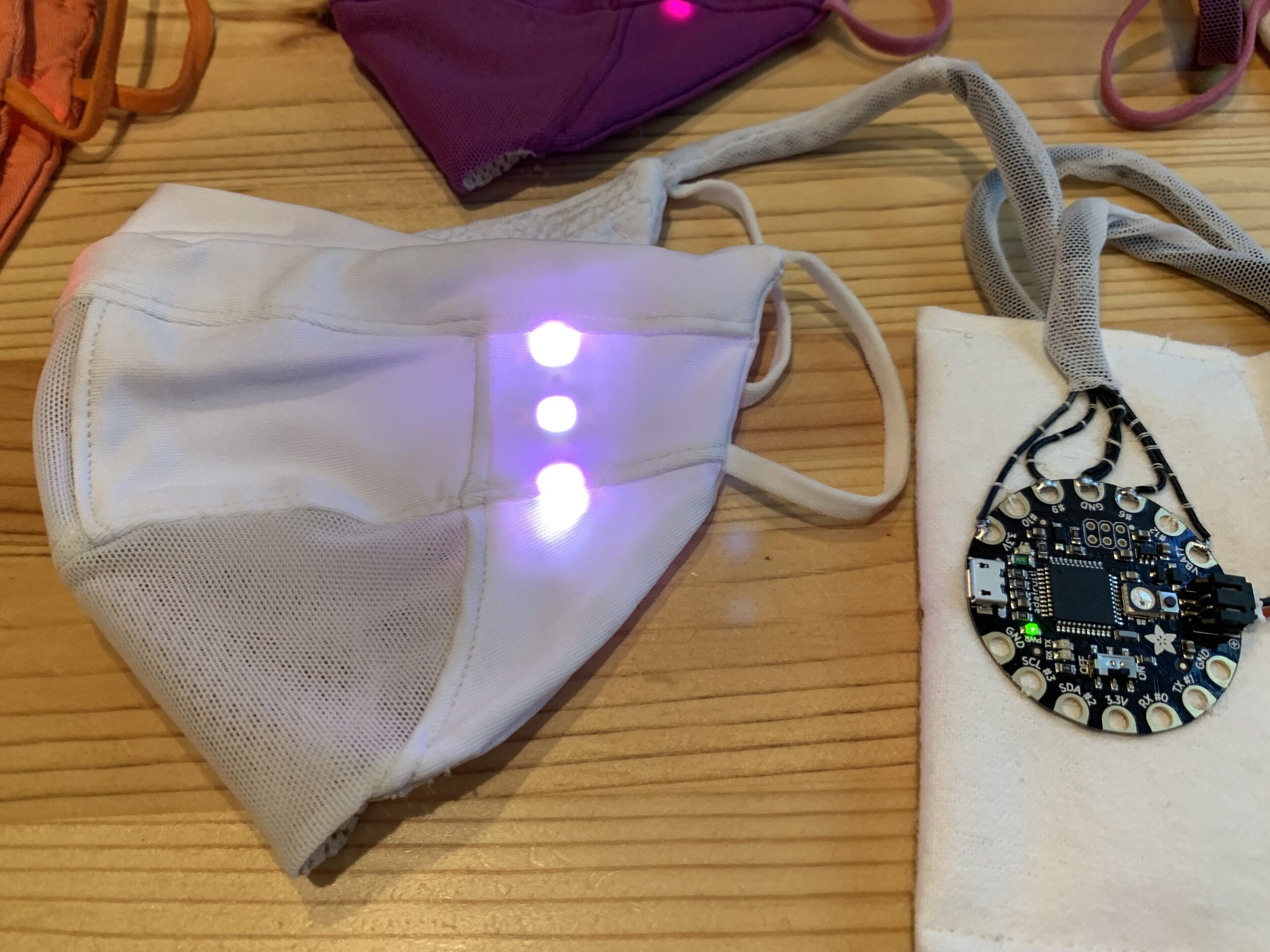 The LEDs responding to sound, and a view of the microcontroller
