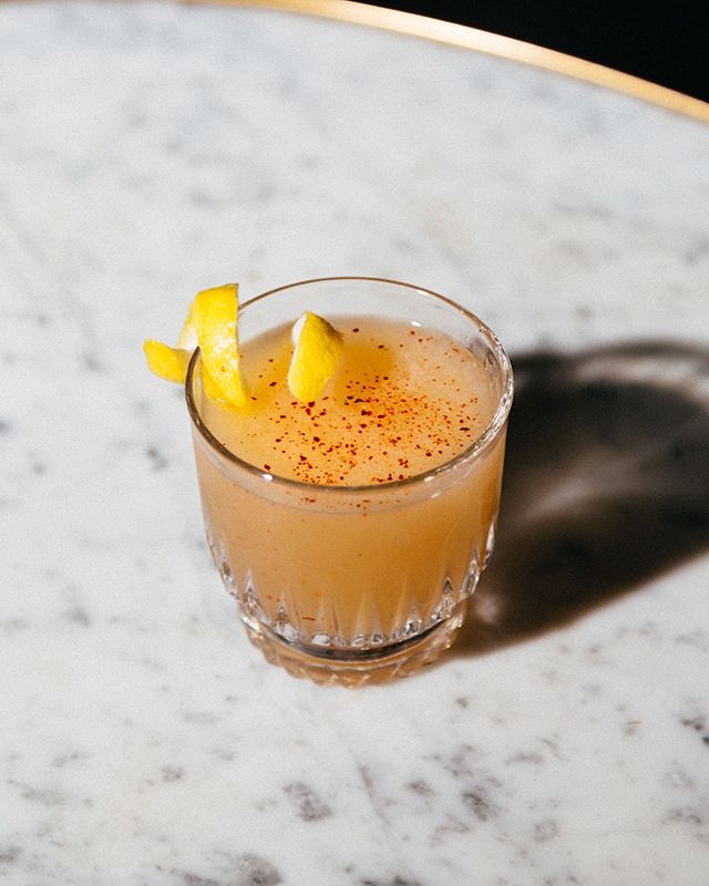 A Marble Lettered Brag, one of our new cocktails with Moonshine, Cacao-Chili Demerara, Lemon, and Smoked Apricot Bitters

#cocktails #moonshine #whiskey #cocktailweather