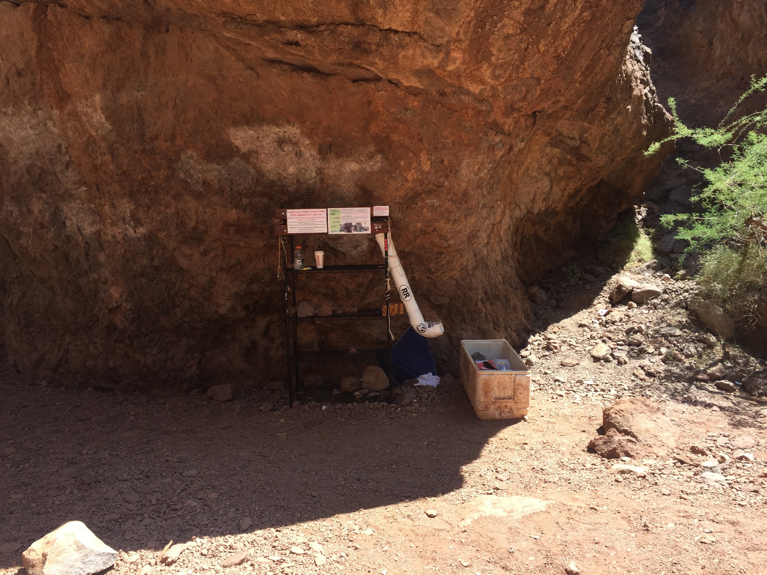 A place to leave extra water for hikers. 