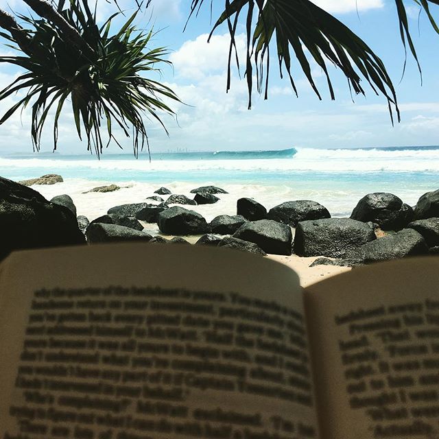 Hella swells and Heller reads! Giving the arms a rest with some Catch 22 in between sessions with Cyclone Oma-gosh. A keen sense of the absurd is needed to handle the crowds.
If we don&rsquo;t get washed away come and visit us @byronbaysurffestival m