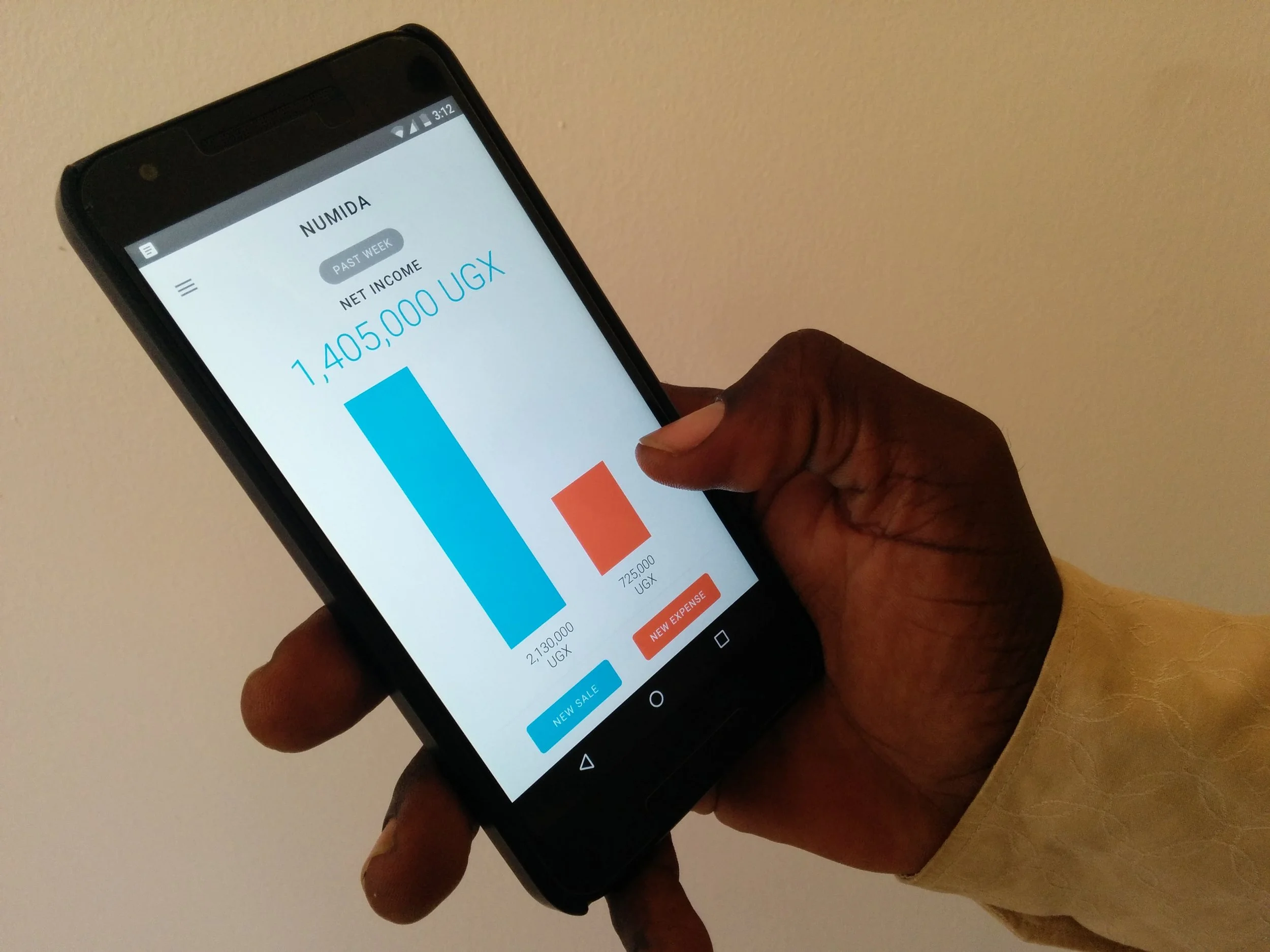 A staff member demos the Numida interface.