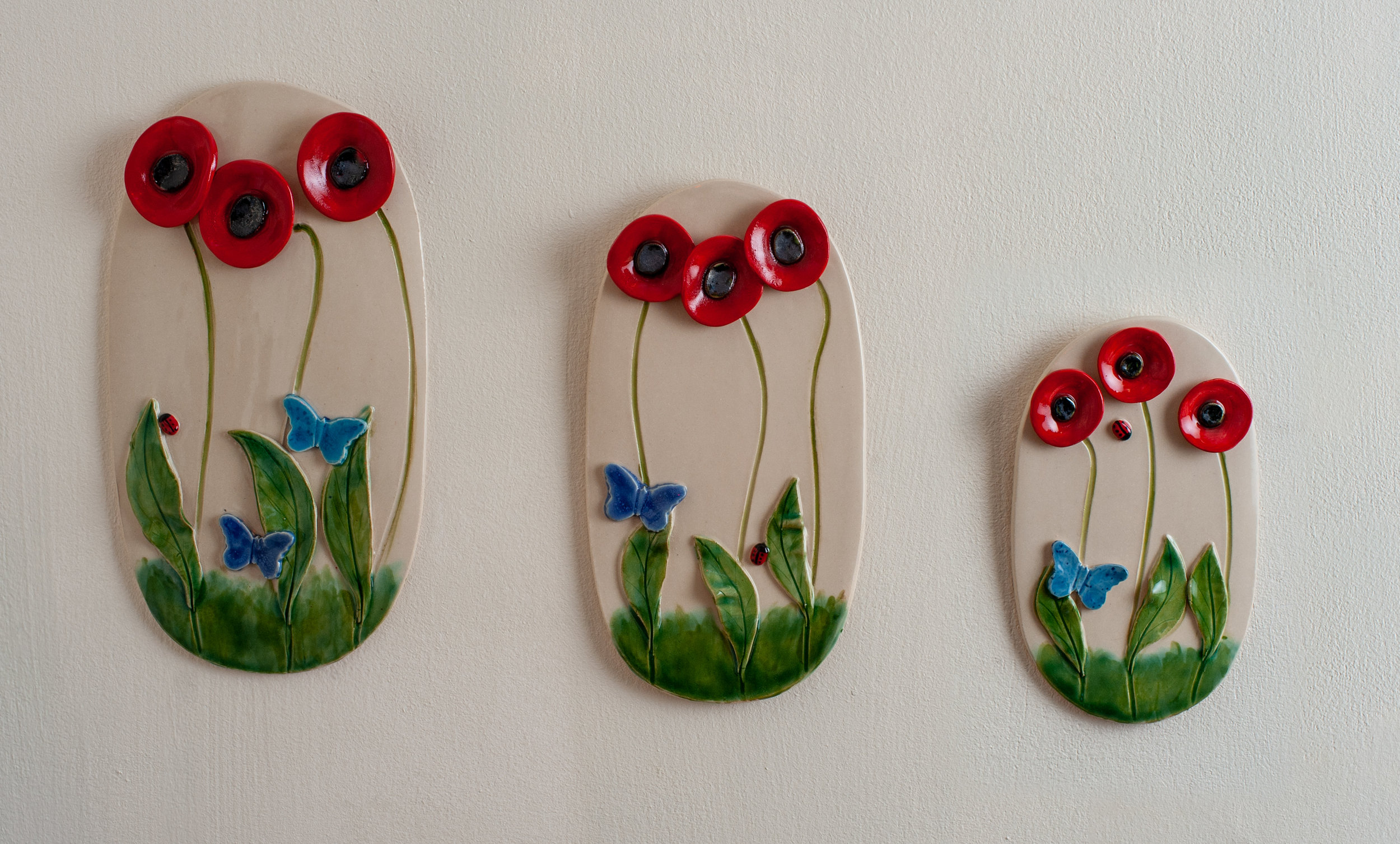 16 Poppy Wall Plaques.jpg