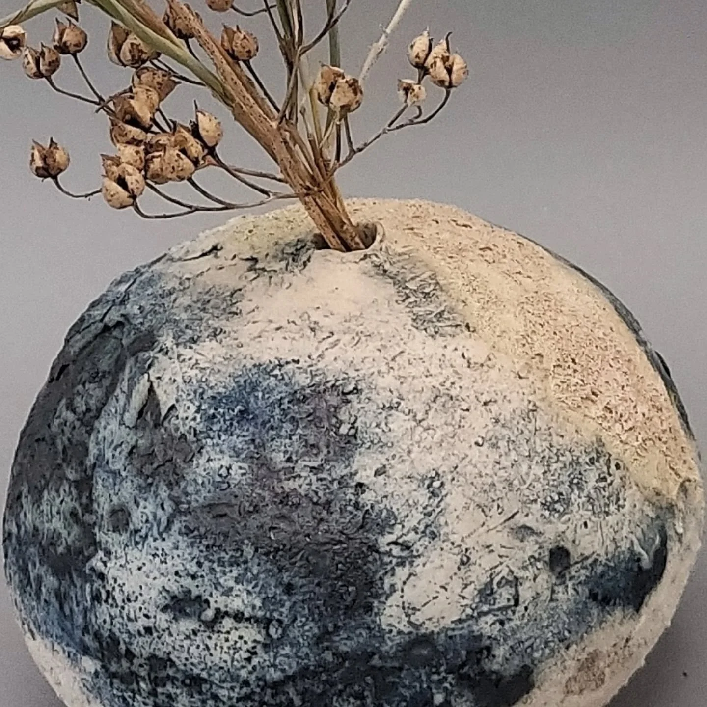 New Work,
Playing with clay, having fun exploring textured and shapes.

These mini bud vases are tactile sketches of the landscape. Handcrafted in stoneware, each piece captures the deeper textures and hidden colors of the landscape that often go unn