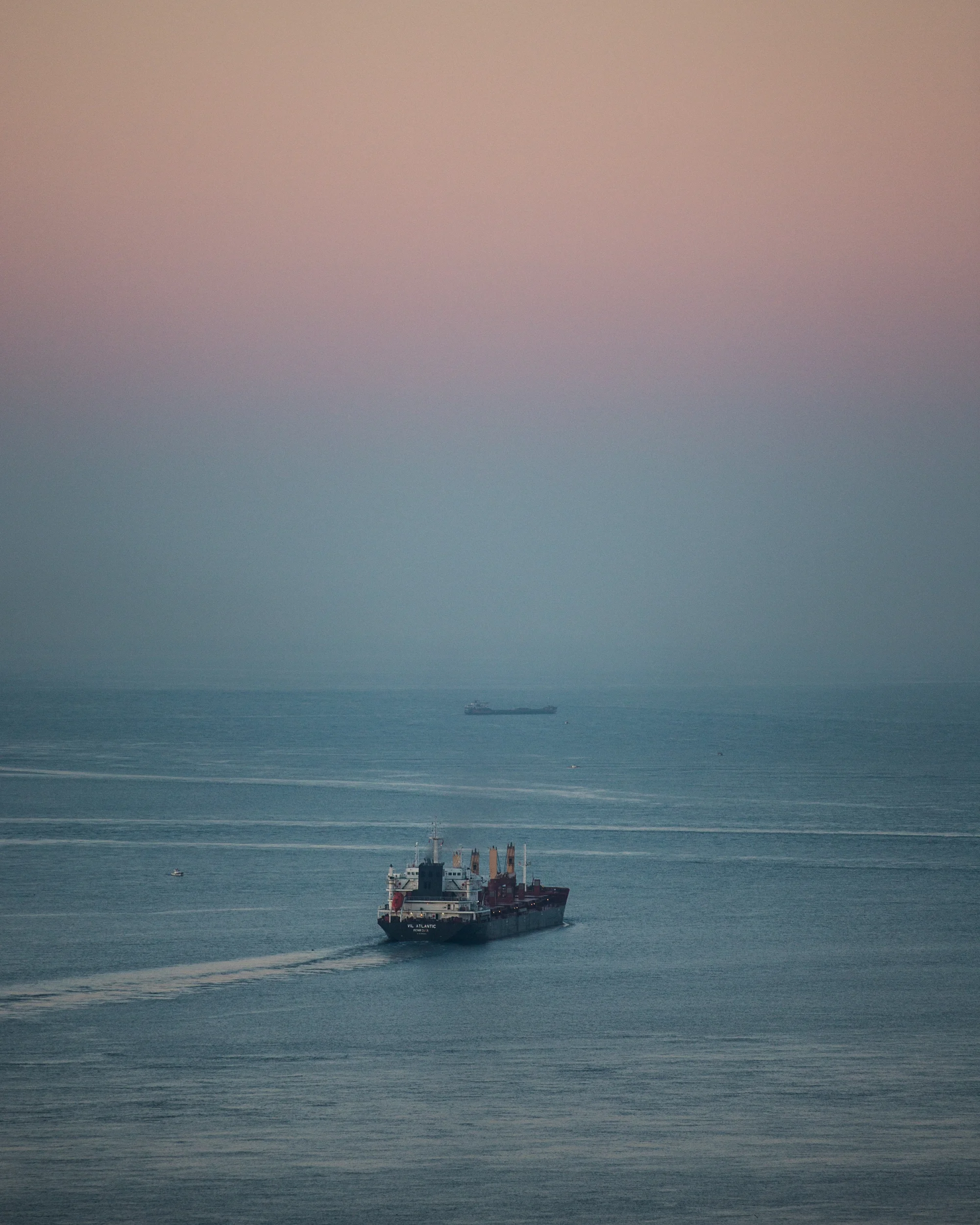 Cargo ship makes his way through the Bosporus at dawn