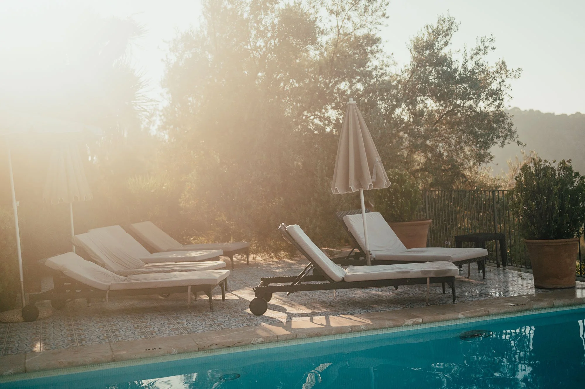 Ca’s Xorc Luxury Retreat Mallorca sunlit poolside Tramuntana mountains boutique finca hotel Port de Sóller Mallorca