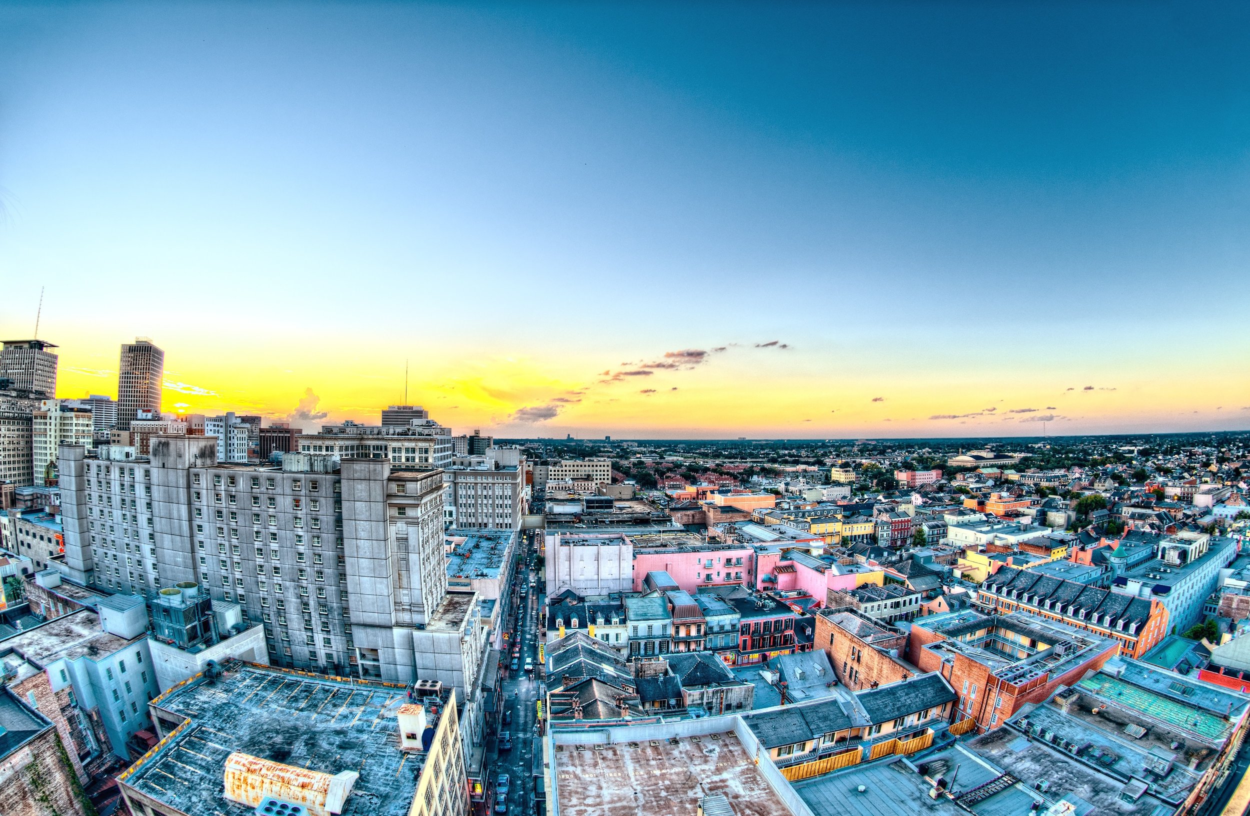 Panoramic image of a city at sunset