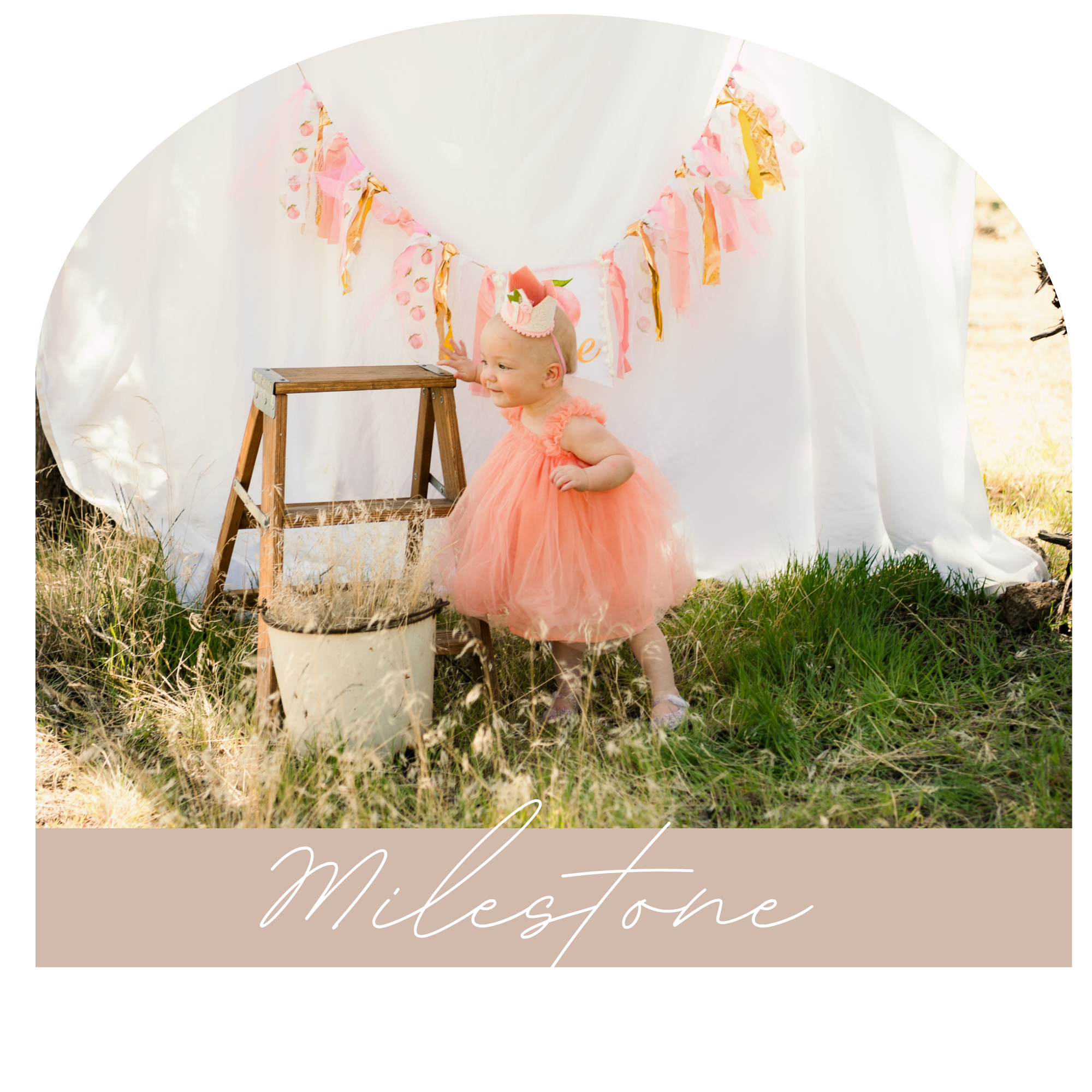 A young girl in a peach-colored dress stands outdoors in front of a white backdrop with pink and gold banner decorations, smiling while holding a small flower crown on her head. The scene appears to celebrate a milestone, as indicated by the text "Milestone" on a banner at the bottom of the image.