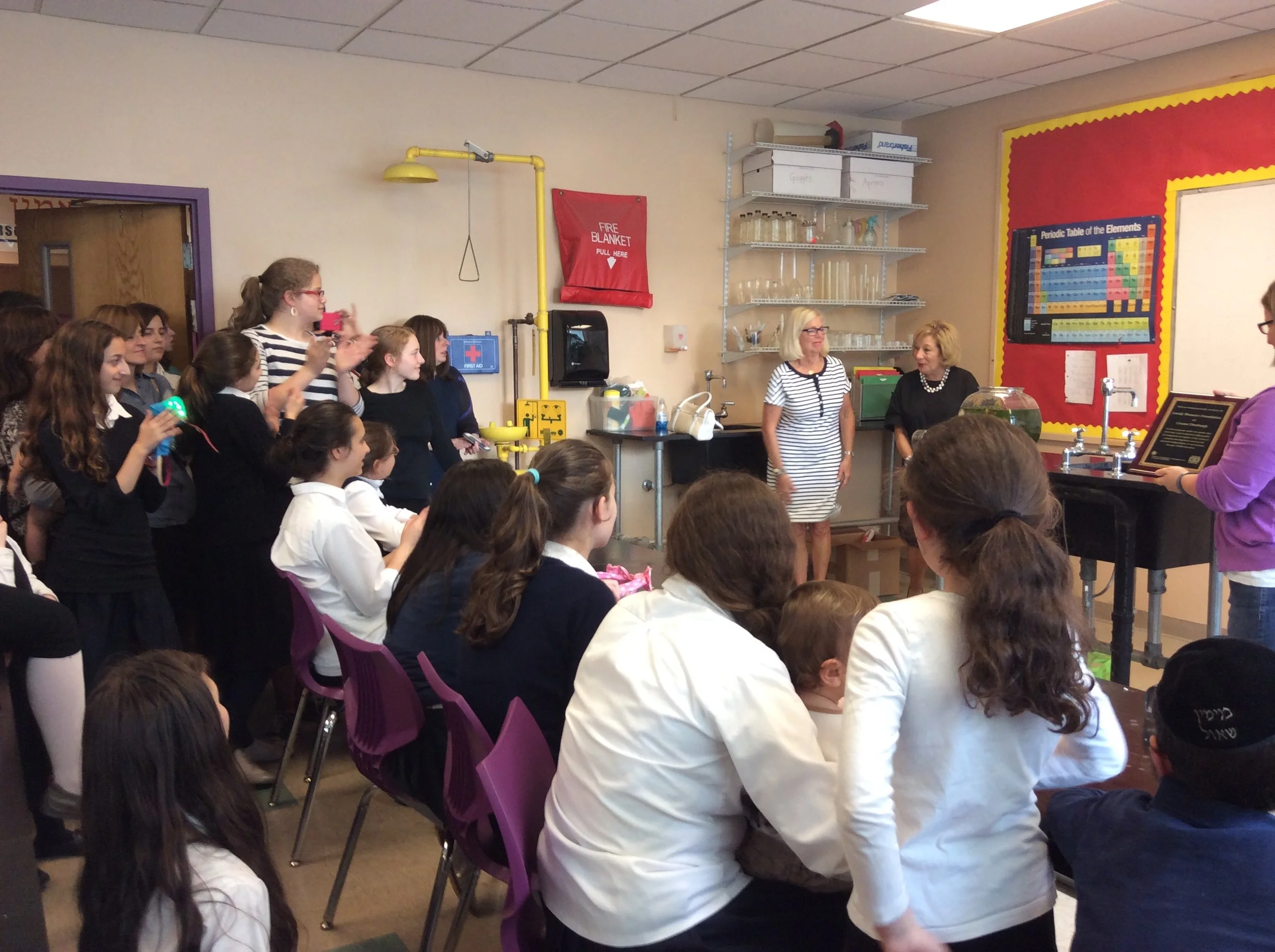 Pittsburgh JWF Trustees celebrate the dedication of the new science lab with students from the Yeshiva Girls School.