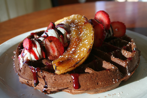 - Nutella Belgian Waffle with Strawberry Sauce, Banana Brulee, and Vanilla Bean Whipped Cream