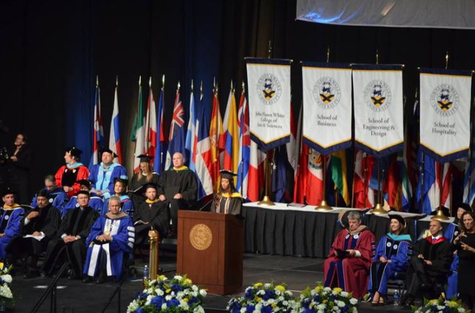 Jasmine addressing her fellow students as the May 2016 Commencement speaker