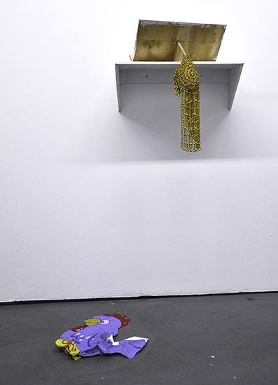  GEO WYETH: artifacts from performance (Gold headpiece, golden knife and plastic chicken), 2014. 