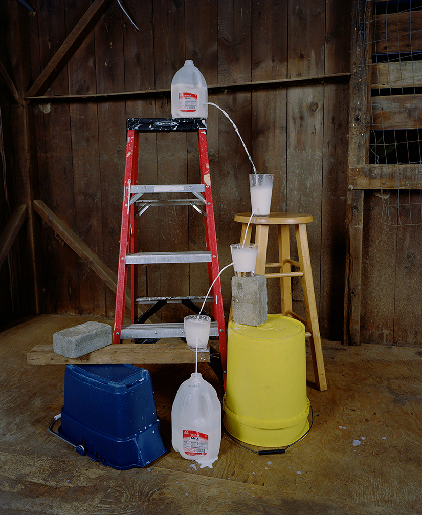  Adam Ekberg: Transferring a gallon of milk from one container to another, 2014, archival pigment print, 50 x 40 inches, Courtesy of the artist and ClampArt, New York City 