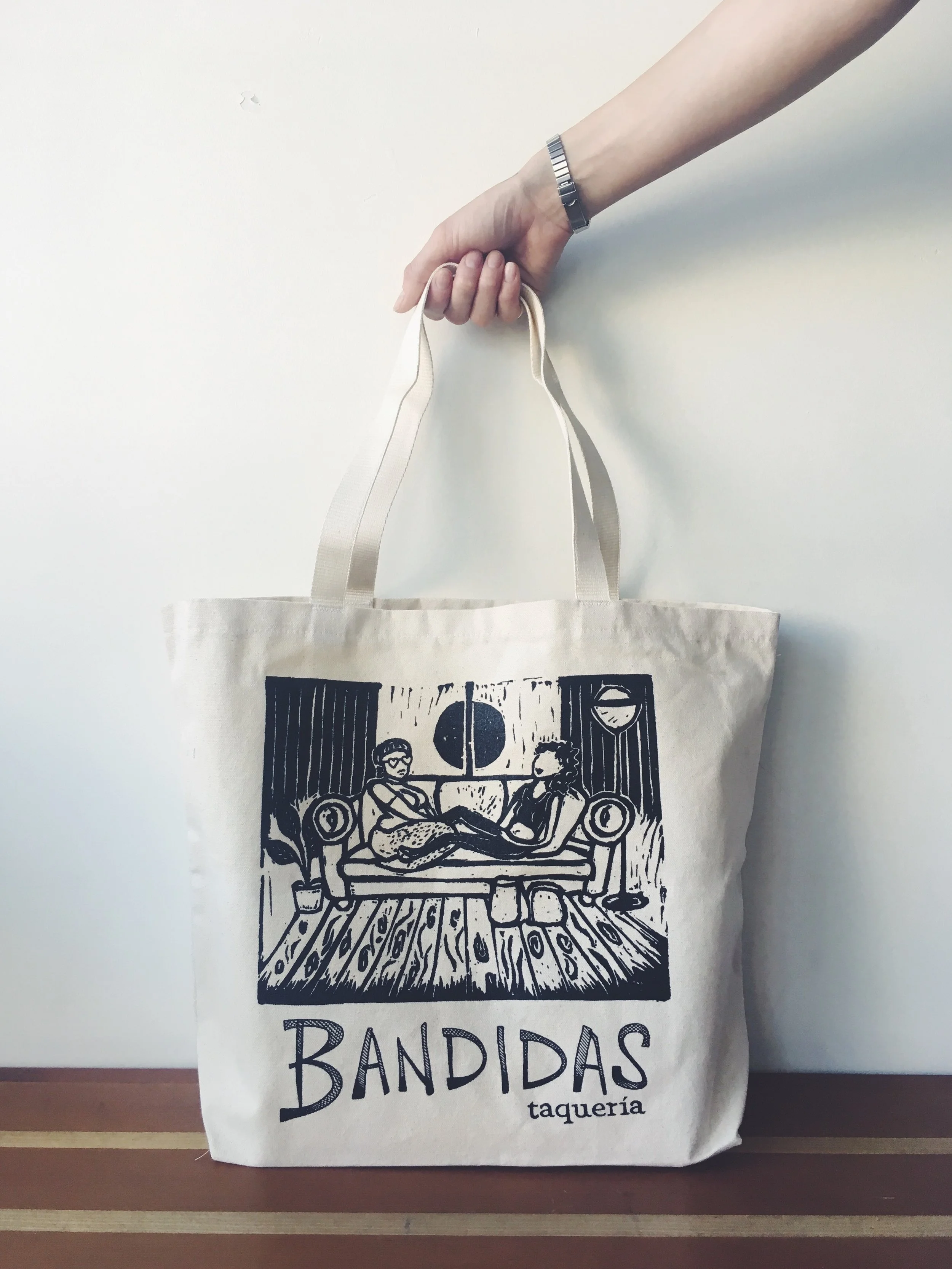 Bandidas' Pride Tote Bags in support of Qmunity