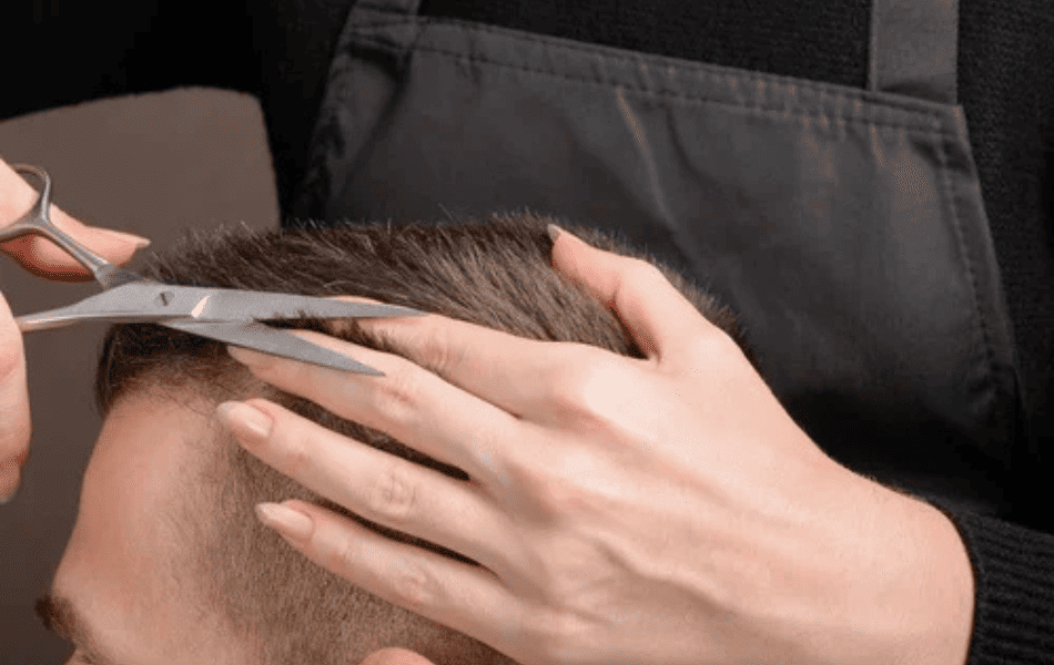 Barber  fixing a bad haircut for men
