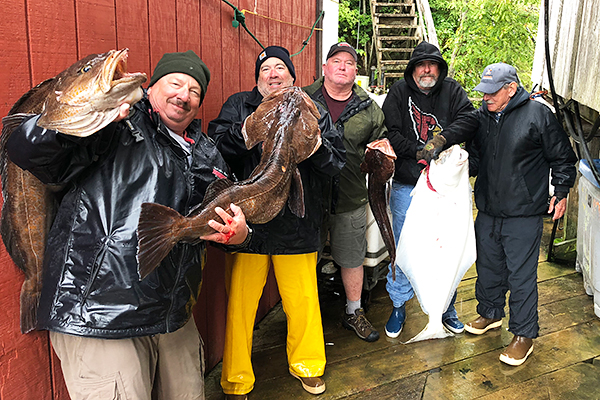 charter-anglers-with-huge-lingcod-se-alaska.jpg