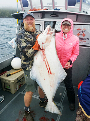 charter-captain-with-angler-and-halibut-southeast-ak.jpg