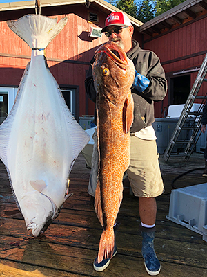 charter-fisherman-with-monster-lingcod-halibut-alaska.jpg