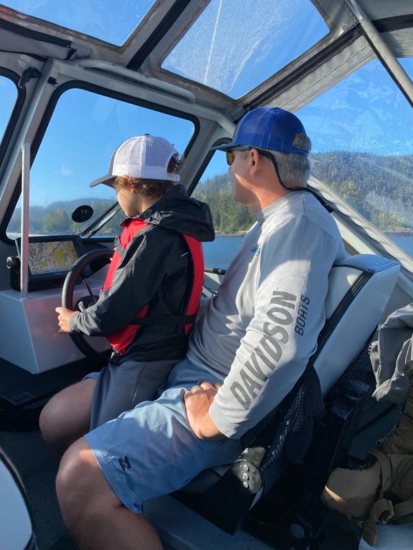 father-and-son-driving-self-guided-fishing-boat-alaska.jpg