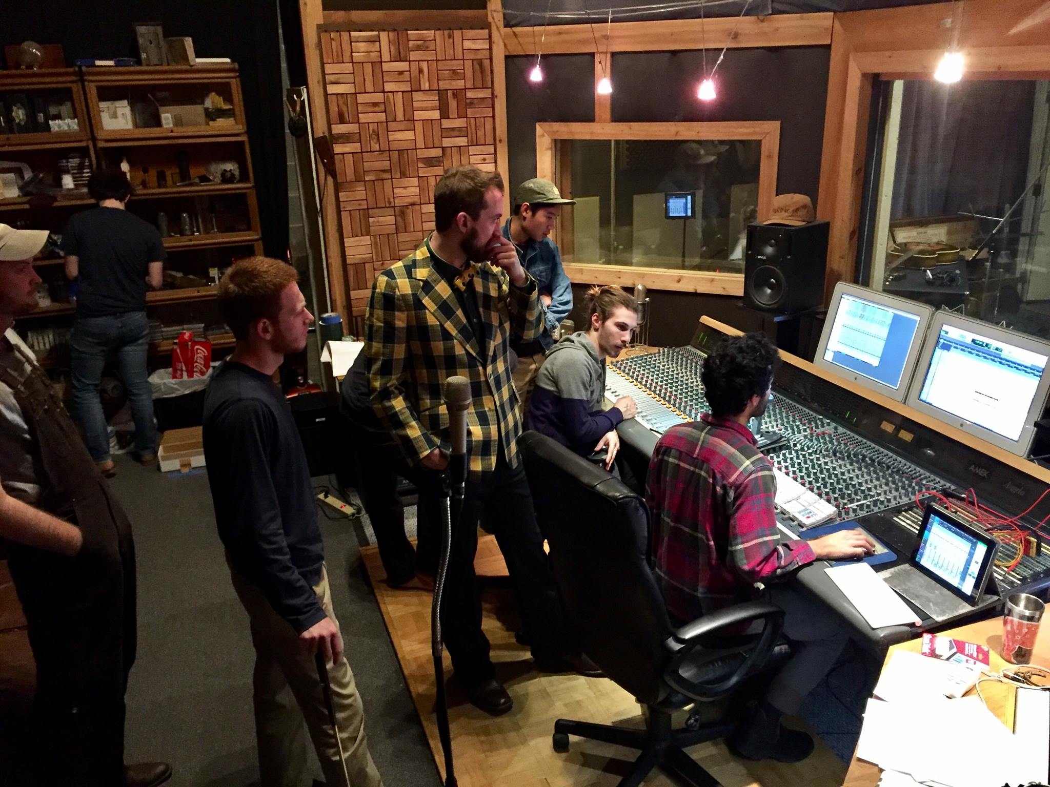Hey everybody! After a short break for the holidays, we made a new home for ourselves in the Rubber Room recording studio in Chapel Hill. We instantly felt the history of the space, a studio which has seen many of our favorite artists. North Carolina favorites from Carolina Chocolate Drops to Mipso and Mandolin Orange have all recorded in the same room. Jerry Brown of the Rubber Room ran the sessions alongside the Wolfman himself, Noah Adams of New Orleans’ Dirty Bourbon River Show. Their combined experience and a fresh batch of Shambles songs made for a very exciting mix. The album intertwines songs familiar to fans of our live show with brand new songs that have yet to be premiered. We’re excited to share our new creation. A big thanks to Kamala Lee for documenting the process with these sharp photos. Stay tuned for more show announcements. We’re gearing up for a huge Spring and Summer. Need some more Shambles in your life? Please direct all booking inquiries to theshamblesmusic@gmail.com.