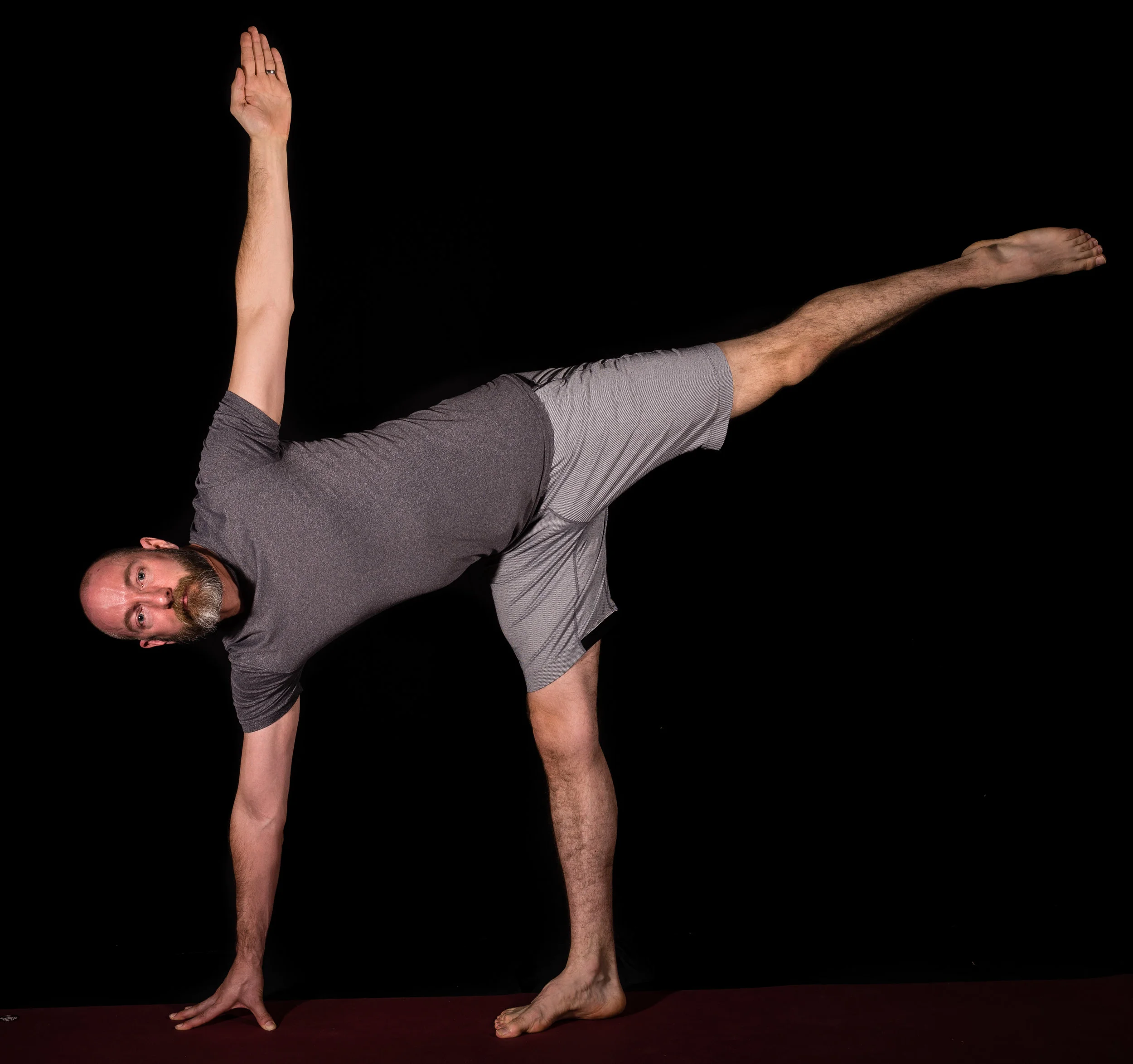 David practising Balance in the "Ardha Candrasana" or Half Moon Pose
