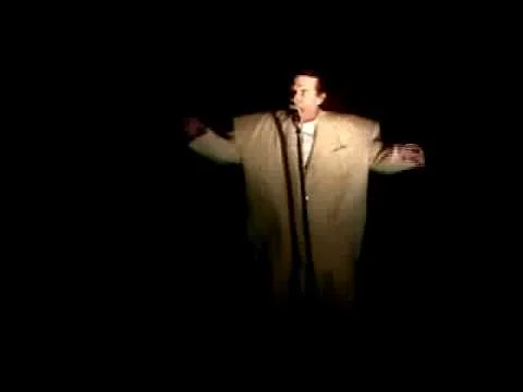 Al in a big white suit 