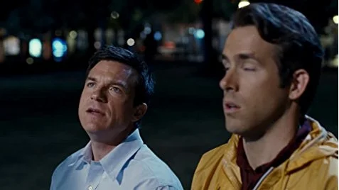 Hancock's publicist and the Green Lantern in the same movie? And it's not a superhero movie? What a waste.