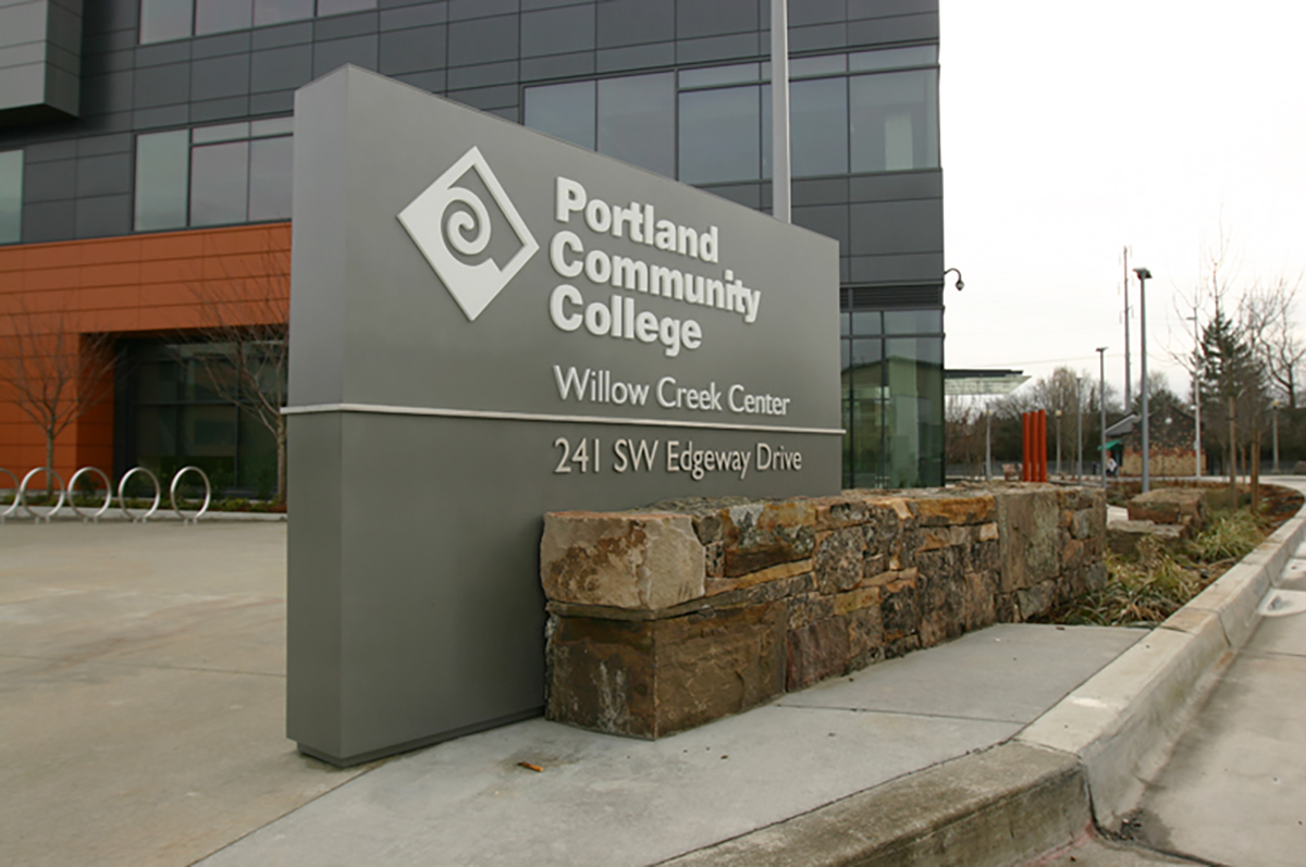 Portland Community College's three story, 97,000 sq. foot Workforce Training Center, located at the Willow Creek Transit Center. The transit oriented development brings together community services opportunities for higher education, workforce training and continuing education for the regions residents. The comprehensive exterior and interior wayfinding program focuses primary wayfinding from the transit center, parking into and throughout the building. Signs materials and finishes reflect the buildings modern aesthetic. 