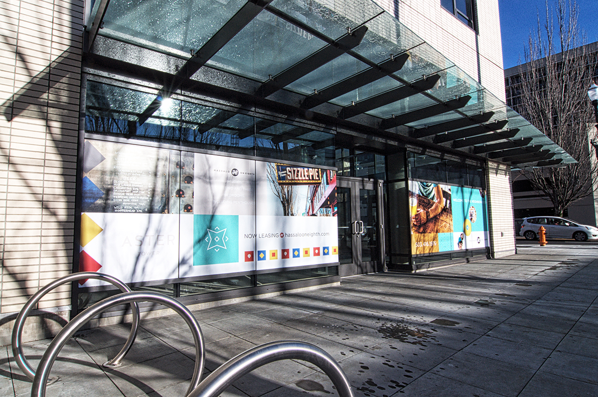 A/D designed and provide build services for the three building retail graphic wraps to market the retail spaces and life style of Hassalo on Eight.