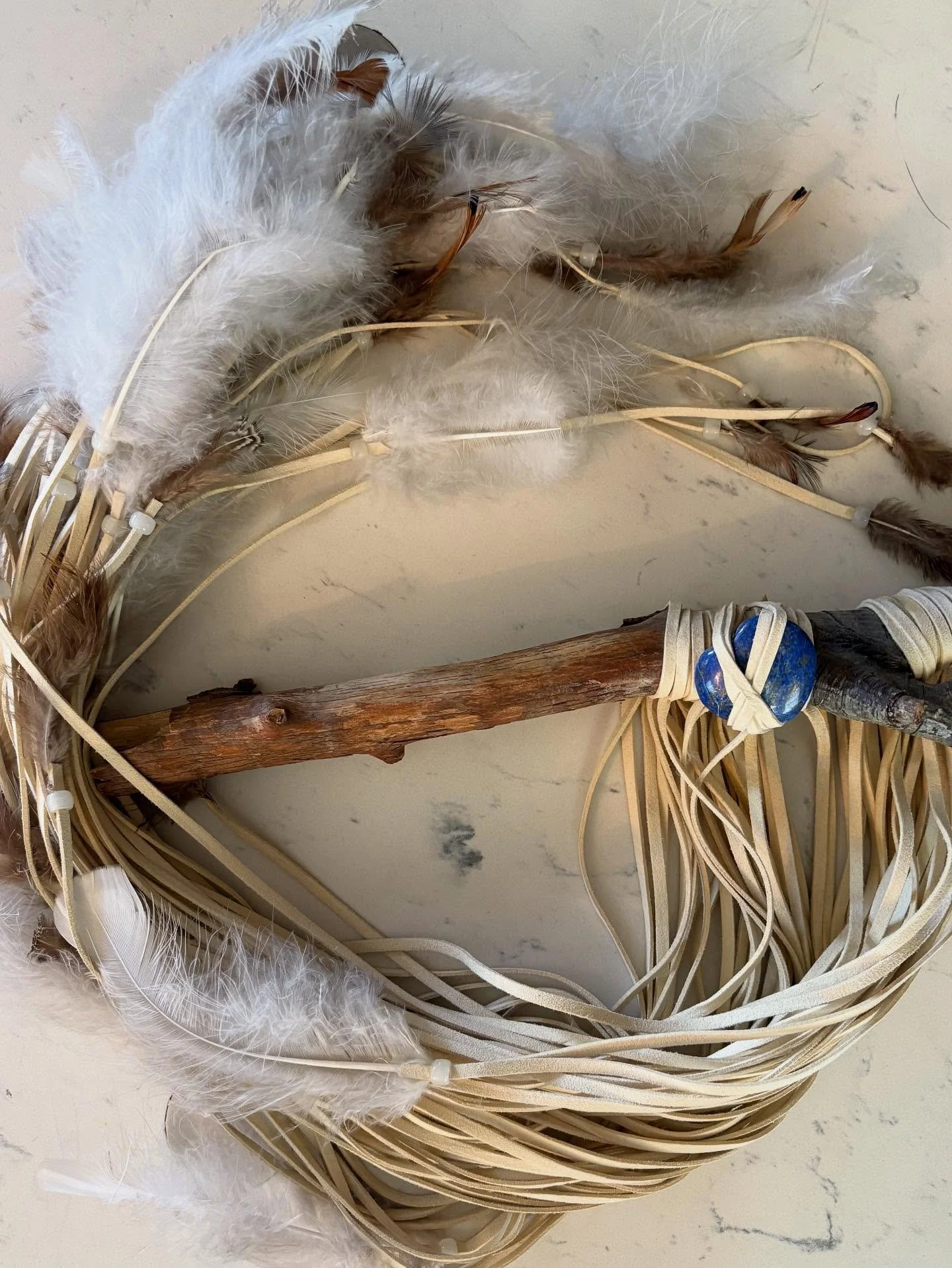 Wallhanging with lapis 

#wallhanging #wallart #homedecor #boho #style #feathers #lapis #stones #handmade #artist