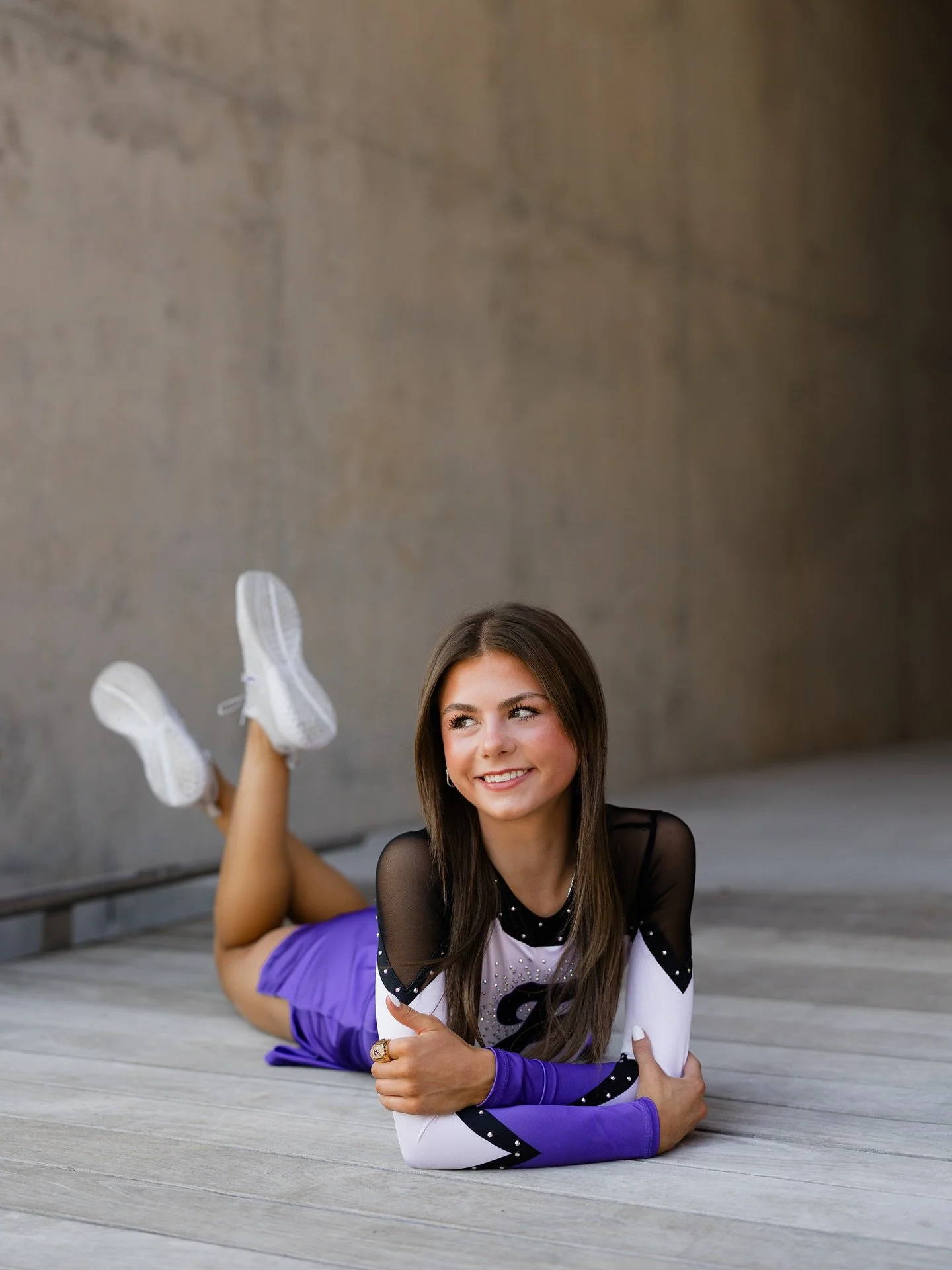 A regret I have about my own senior photos is I didn&rsquo;t take any photos with my volleyball uniform. Sports was a HUGE part of my life throughout my entire life and I wish I would have brought it to my senior photos! I love when seniors bring the