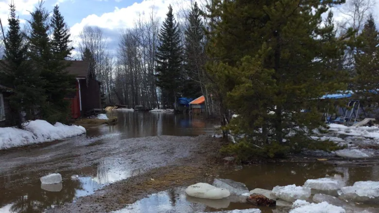 Sambaa K'e, N.W.T., drying out after flash flood Sunday