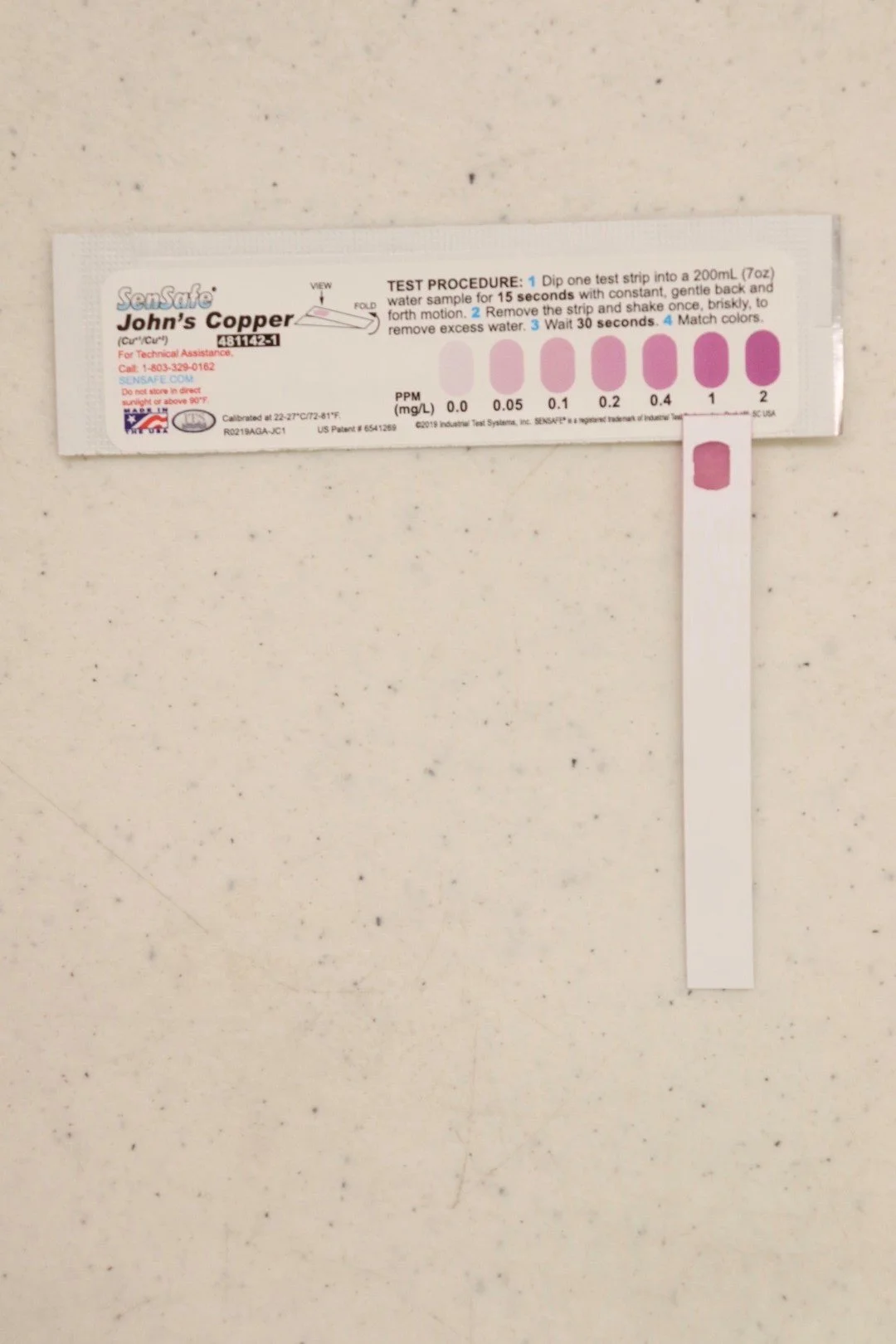 Comparing Copper Test Strip to Results Chart.jpg