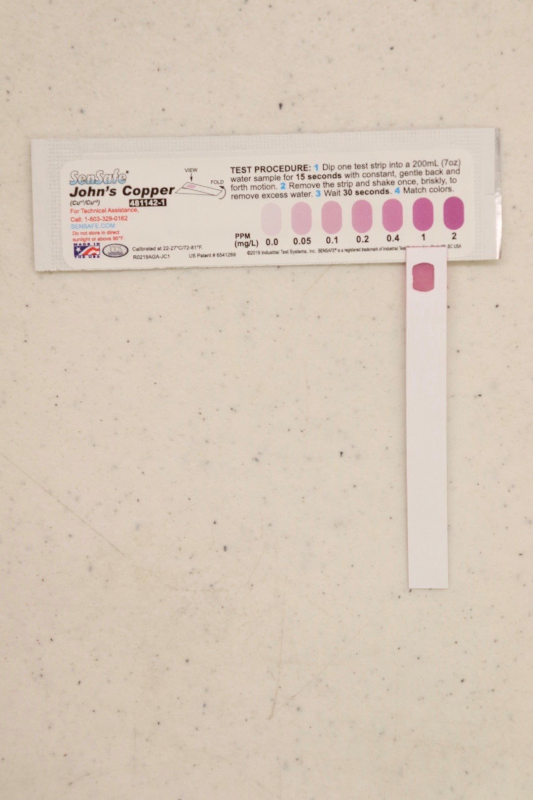 Comparing Copper Test Strip to Results Chart.jpg