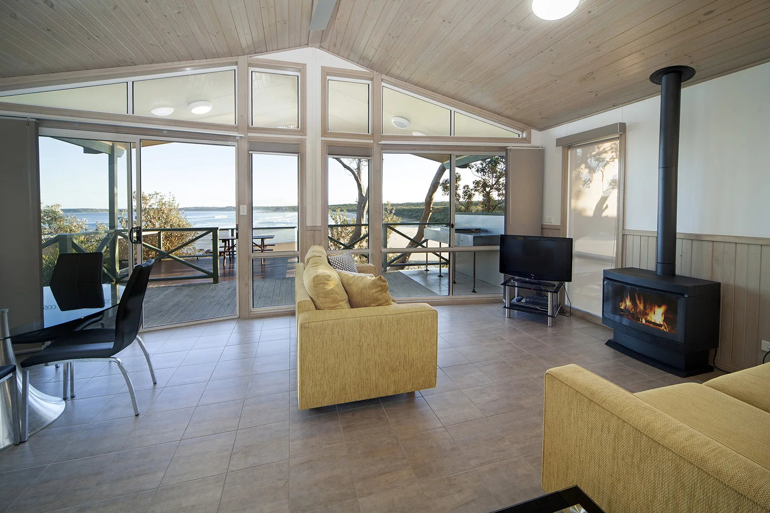 Oceanfront+Deluxe,+Chalet+17+living+area+1+with+fire.jpg