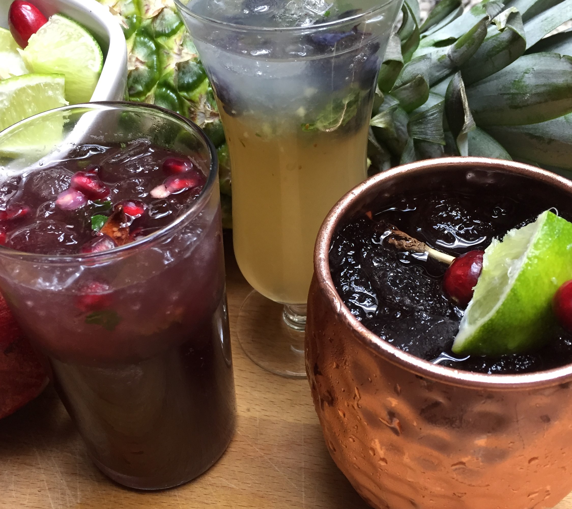From left: Rosemary Pomegranate "Faux"hito, The Jack Frost & The Cranberry Mule Mocktails