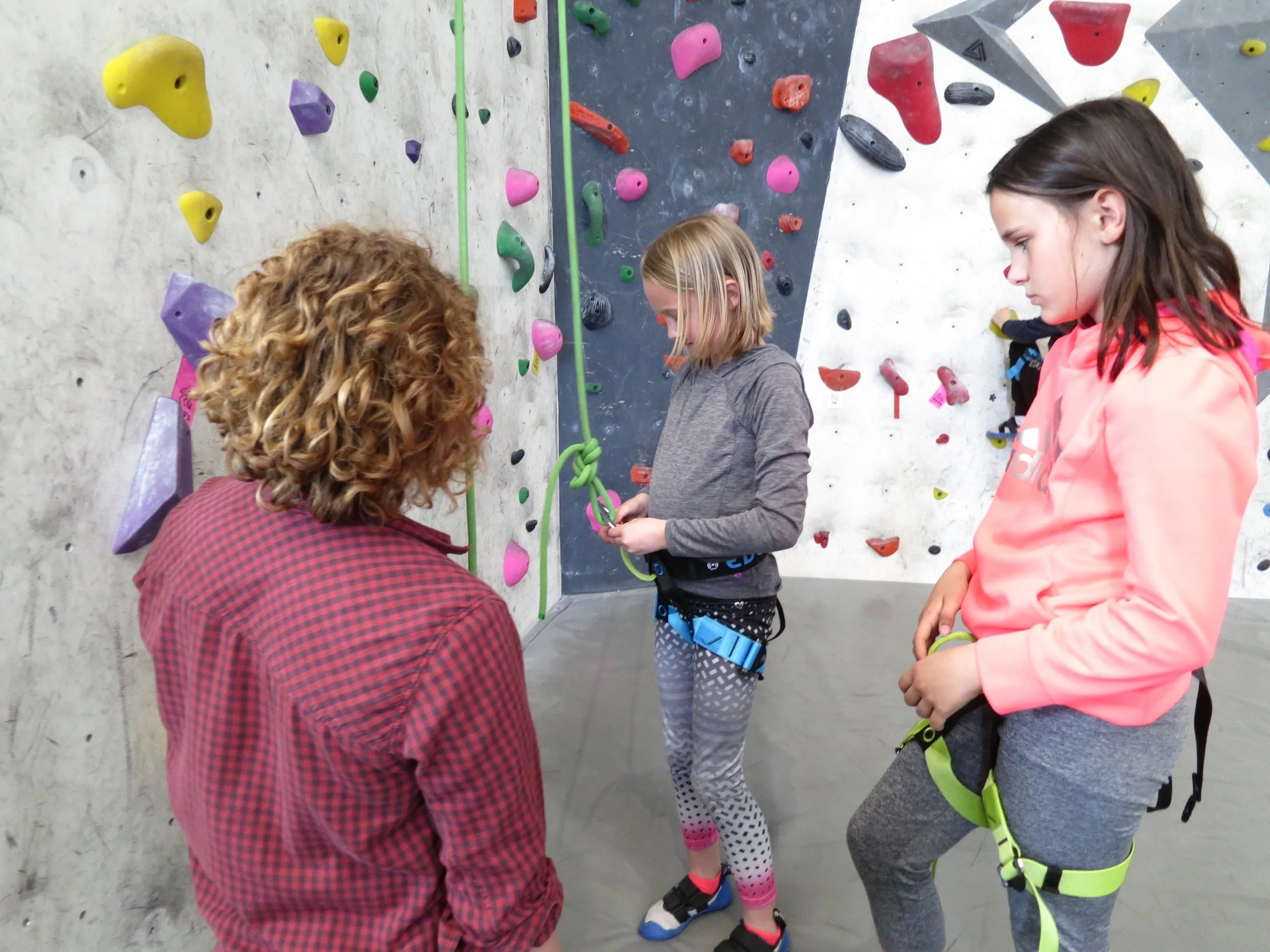 Campers learning how to tie their climbing knots during a week full of fun and learning!