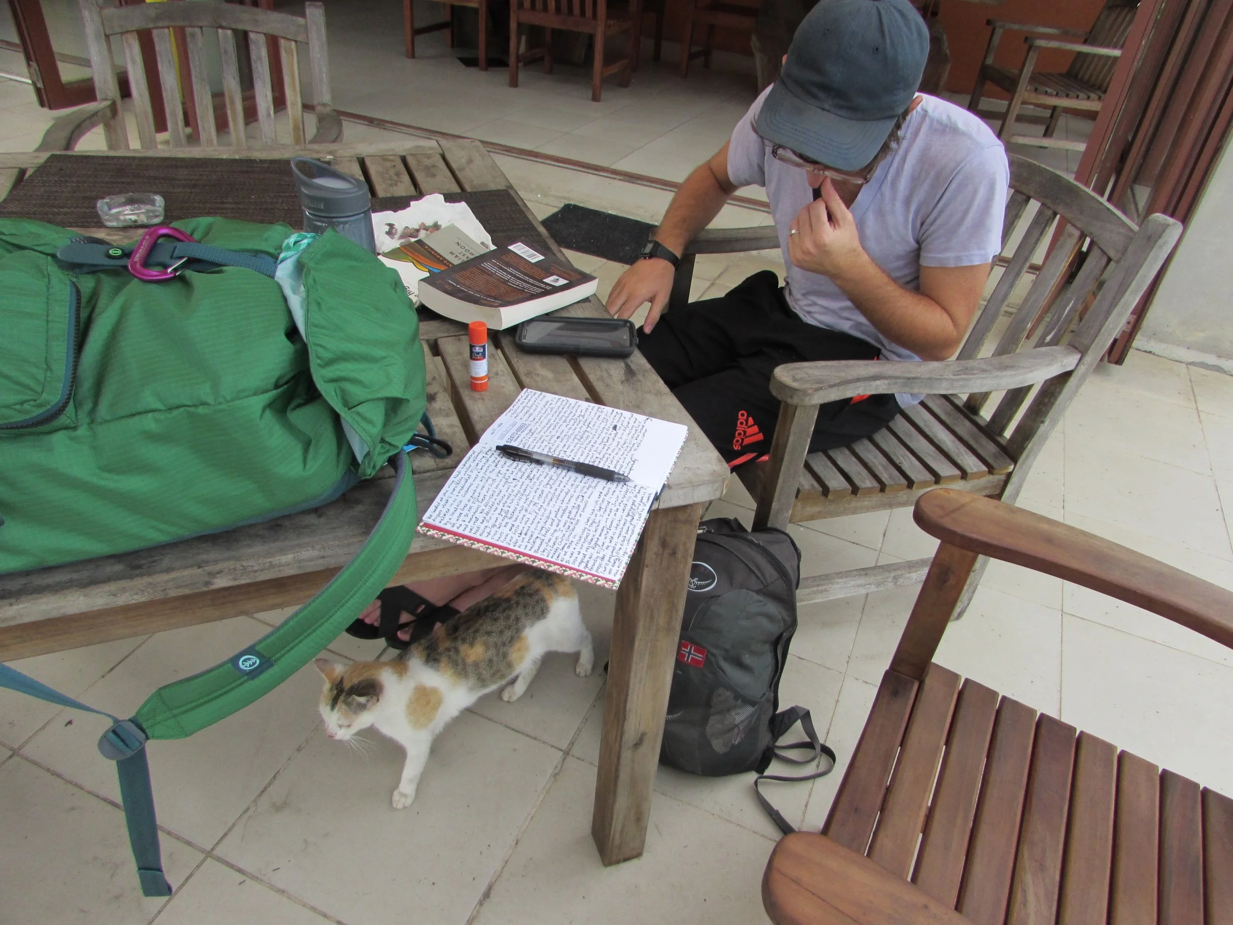Stepping away from my open journal on the patio of our hostel in Nadi, Fiji while we waited for reception to officially open.